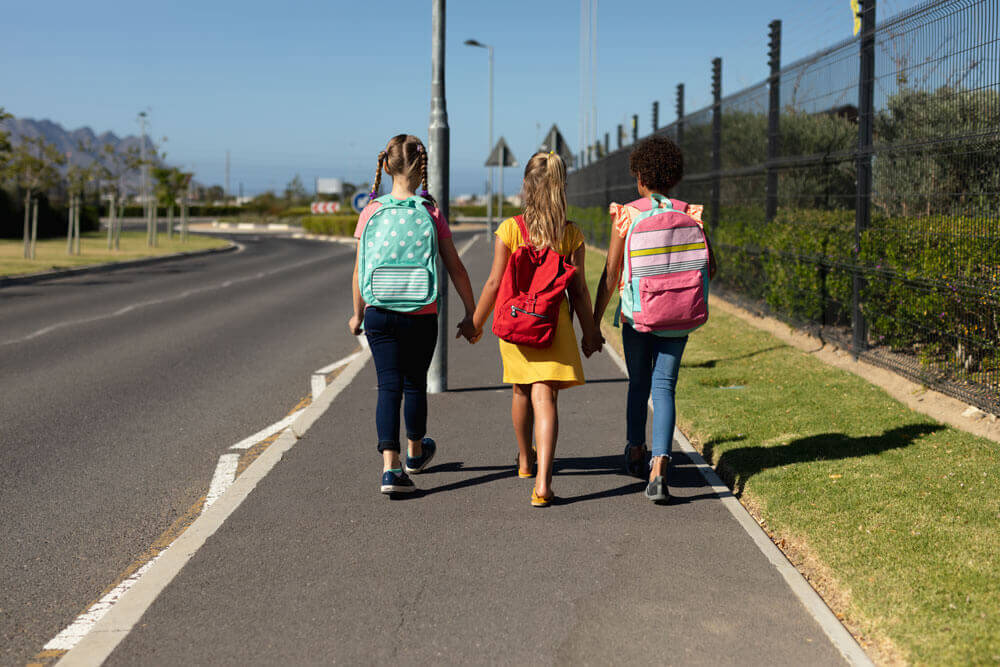 Three children walking