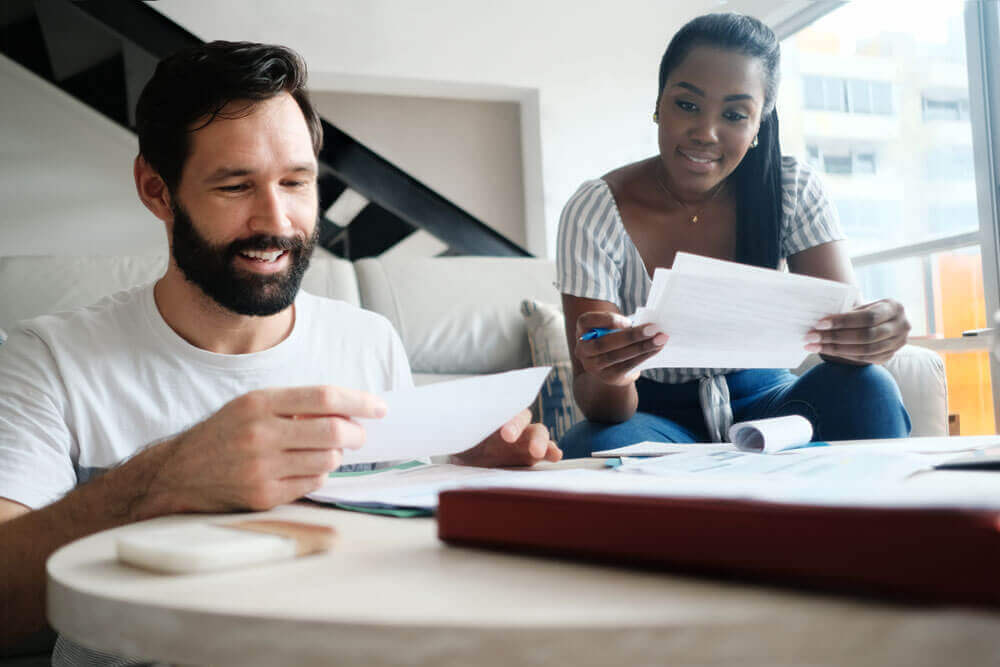 Two people planning their budgets 